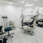 Modern dental treatment area with multiple patient chairs prepared for implant and restorative procedures in Tijuana, Mexico