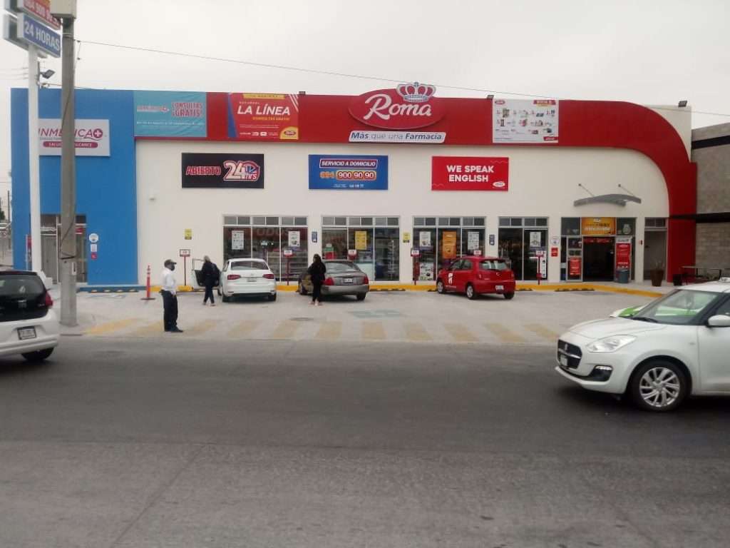 Farmacia Roma meeting location near the U.S.–Mexico border where Dr. Mexico Dental Group patients are greeted and assisted with transportation to the clinic in Tijuana