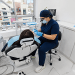 Patient receiving dental treatment at Dr. Mexico Dental Group's modern clinic in Tijuana, Mexico.