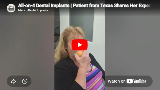 Texas All-on-4 patient demonstrating biting into an apple after full-mouth dental implant treatment at Dr. Mexico Dental Group.